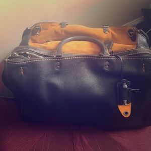 Coach Pre-Loved Rogue Brief in black with dust bag